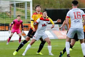 Ally Love holds off Partick Thistle's Ciaran McKenna during Clyde's defeat at Firhill (pic: Craig Black Photography)