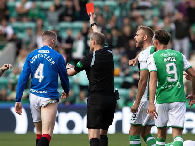 Willie Collum shows a red card to Rangers midfielder John Lundstram. (Photo by Alan Harvey / SNS Group)
