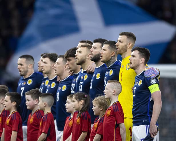 Scotland players line up during the national anthem prior to the win over Spain at Hampden in March. (Photo by Ross MacDonald / SNS Group)