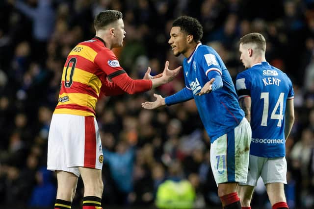 Partick's Anton Dowds (L) speaks to Rangers' Malik Tillman after he controversially makes it 2-1. (Photo by Alan Harvey / SNS Group)