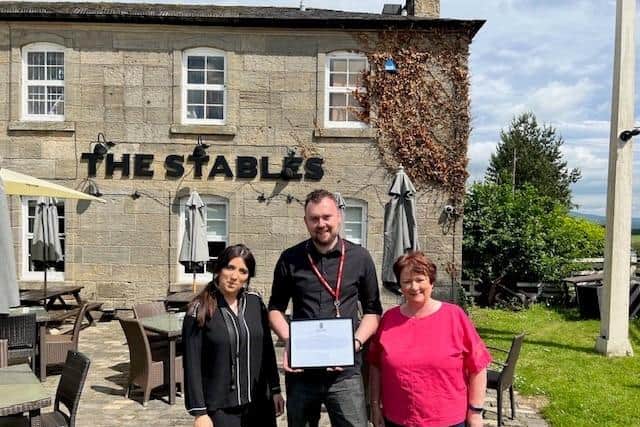 MSP Rona Mackay, pictured right, with management team Stuart Brand and Sophie Clarke at the Stables, Kirkintilloch