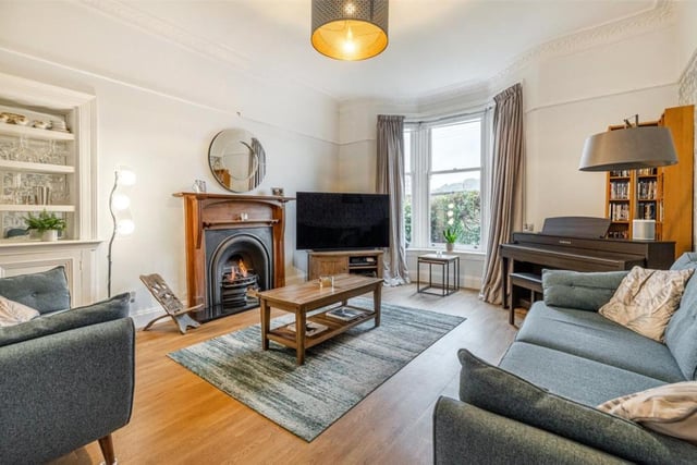 The living room has a focal point fire place.