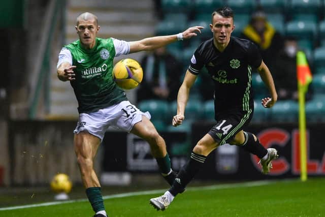 Alex Gogic competes with Celtic's David Turnbull during the last meeting between the clubs at Easter Road in late October. Picture: SNS