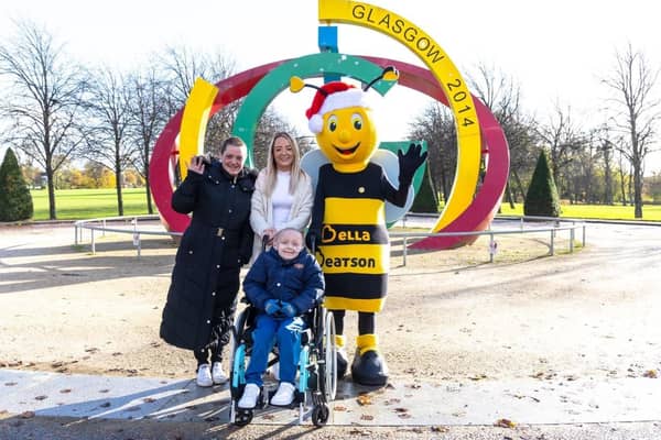 Cole is pictured with his mum, Michelle (left), his aunt Lisa and Bella the Bee at Glasgow Green where the Santa Dash will take place.