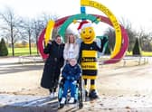 Cole is pictured with his mum, Michelle (left), his aunt Lisa and Bella the Bee at Glasgow Green where the Santa Dash will take place.