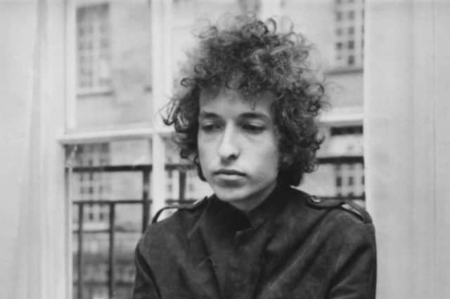 Bob Dylan at a press conference in London, 1966. (Photo by Express Newspapers/Getty Images)