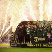 Celtic Captain Callum McGregor lifts the Premier Sports Cup Trophy
 during the Premier Sports Cup Final between Celtic and Hibernian at Hampden Park, on December 19, 2021, in Glasgow, Scotland. (Photo by Alan Harvey / SNS Group)