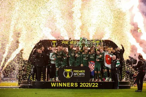 Celtic Captain Callum McGregor lifts the Premier Sports Cup Trophy
 during the Premier Sports Cup Final between Celtic and Hibernian at Hampden Park, on December 19, 2021, in Glasgow, Scotland. (Photo by Alan Harvey / SNS Group)