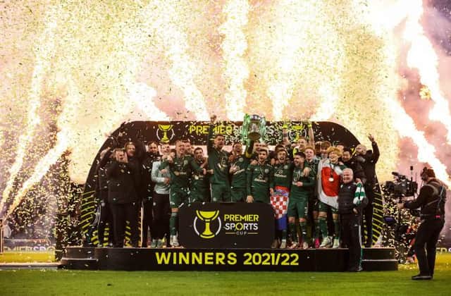 Celtic Captain Callum McGregor lifts the Premier Sports Cup Trophy
during the Premier Sports Cup Final between Celtic and Hibernian at Hampden Park, on December 19, 2021, in Glasgow, Scotland. (Photo by Alan Harvey / SNS Group)