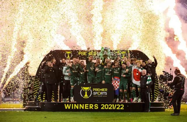 Celtic Captain Callum McGregor lifts the Premier Sports Cup Trophy
 during the Premier Sports Cup Final between Celtic and Hibernian at Hampden Park, on December 19, 2021, in Glasgow, Scotland. (Photo by Alan Harvey / SNS Group)