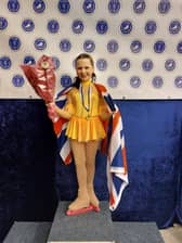 Victoria proudly displaying her medal