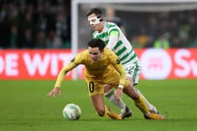 Callum McGregor tussles with Bodo/Glimt midfielder Hugo Vetlesen during the first leg of the Europa Conference League knockout round play-off tie at Celtic Park. (Photo by Craig Williamson / SNS Group)