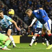 Rangers' Steven Davis nods home the only goal of the match in the 1-0 win over Dundee at Ibrox. (Photo by Rob Casey / SNS Group)