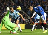 Rangers' Steven Davis nods home the only goal of the match in the 1-0 win over Dundee at Ibrox. (Photo by Rob Casey / SNS Group)