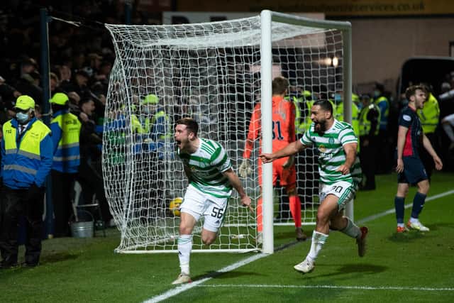 Celtic's Anthony Ralston celebrates his last gasp winner in Dingwall. (Photo by Craig Foy / SNS Group)