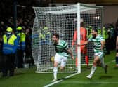 Celtic's Anthony Ralston celebrates his last gasp winner in Dingwall. (Photo by Craig Foy / SNS Group)