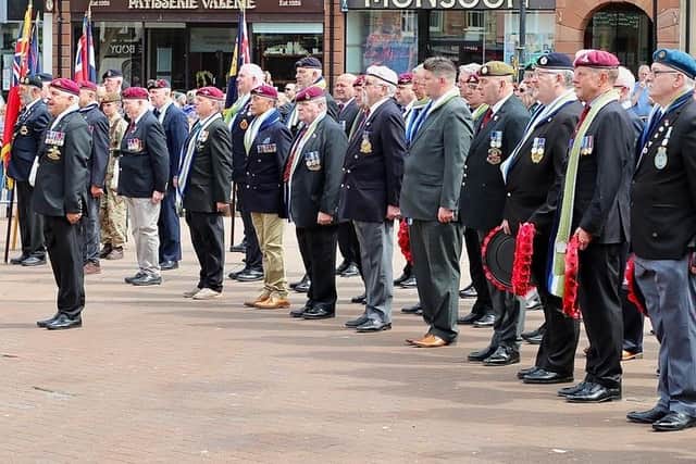 Former service personnel reflected on lost colleagues as they lined-up outside the Old Town Hall in Carlisle as the Falkland Islands’ flag was raised.