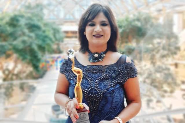 Dr Rashmi Mantri with her trophy at the IIW She Inspires Awards