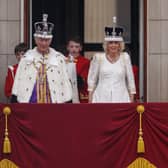 King Charles III and Queen Camilla on the Buckingham Palace balcony after the Coronation (Picture: Dan Kitwood/Getty Images)