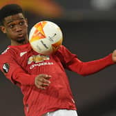 Manchester United's Ivorian midfielder Amad Diallo controls the ball during the UEFA Europa league quarter final against Granada. (Photo by OLI SCARFF/AFP via Getty Images)