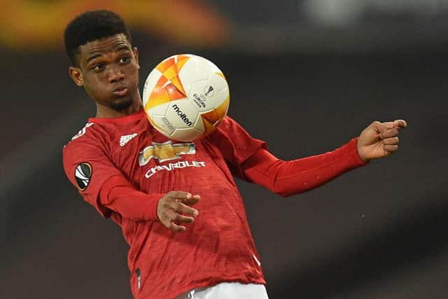 Manchester United's Ivorian midfielder Amad Diallo controls the ball during the UEFA Europa league quarter final against Granada. (Photo by OLI SCARFF/AFP via Getty Images)