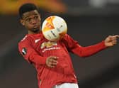 Manchester United's Ivorian midfielder Amad Diallo controls the ball during the UEFA Europa league quarter final against Granada. (Photo by OLI SCARFF/AFP via Getty Images)