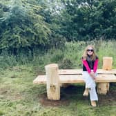 Justyna Stanka is pictured sitting on her competition-winning bench in Fortmonthills Woodland, Glenrothes.