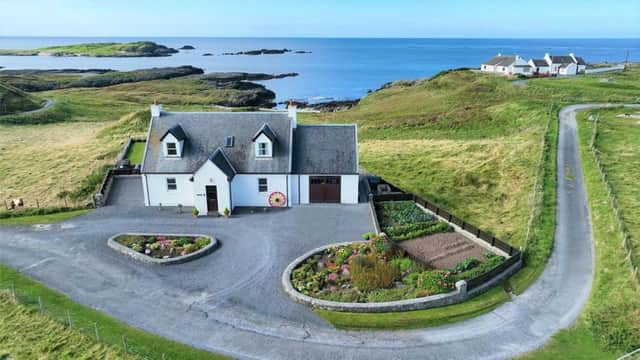 The house is right next to the coastline