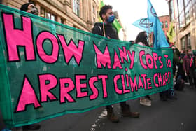 Climate activists from the Extinction Rebellion group demonstrated outside the offices of JP Morgan in Glasgow yesterday. 