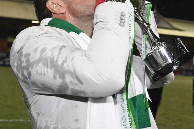 Celtic head coach Fran Alonso with the trophy at full time.