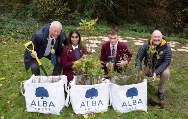 St Ninian’s High pupils Andrew McFadyen and Maria Sattar join East Renfrewshire provost Jim Fletcher and council leader Tony Buchanan