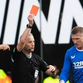 Referee Willie Collum shows Rangers midfielder John Lundstram a red card during the 2-2 draw with Hibs at Easter Road