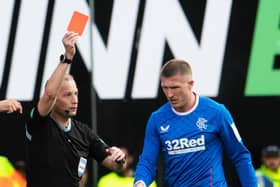 Referee Willie Collum shows Rangers midfielder John Lundstram a red card during the 2-2 draw with Hibs at Easter Road