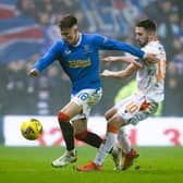 Nathan Patterson holds off a challenge from Dundee United striker Nicky Clark during Rangers' 1-0 win over the Tannadice side at Ibrox on Saturday. (Photo by Alan Harvey / SNS Group)