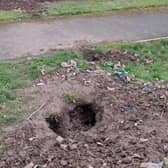 Badger have been digging in Lanark Cemetery causing damage