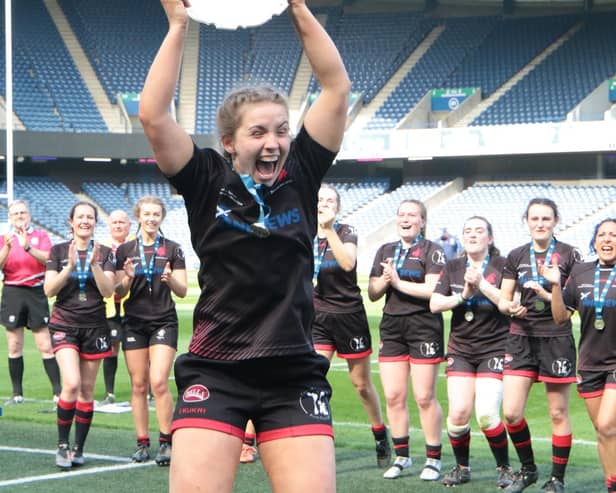 Biggar cptain Abbie Baillie jumps for joy after being presented with National Plate (Pics by Nigel Pacey)