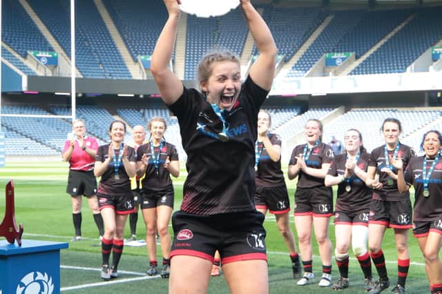 Biggar cptain Abbie Baillie jumps for joy after being presented with National Plate (Pics by Nigel Pacey)