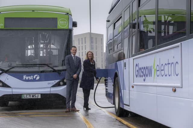Duncan Cameron, MD for First Bus Scotland, shows Minister for Transport, Jenny Gilruth, around the Caledonian depot