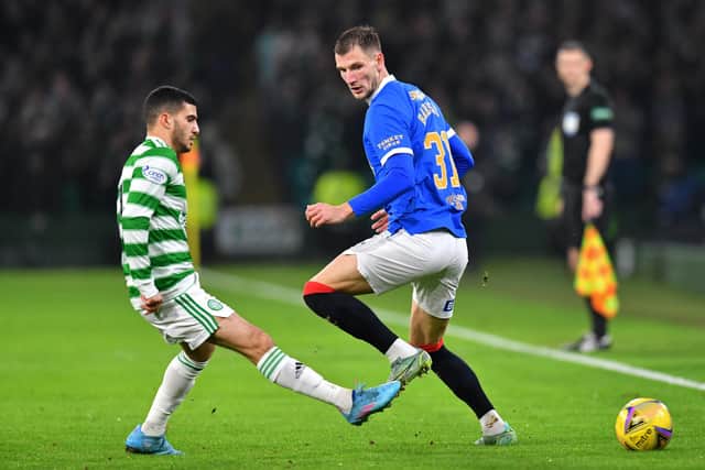 Rangers left-back Borna Barisic, pictured in action against Celtic winger Liel Abada, endured a difficult 45 minutes before being substituted in the Old Firm clash at Parkhead on February 2. (Photo by Mark Runnacles/Getty Images)