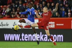 Rangers midfielder Glen Kamara tussles for possession with Aberdeen captain Scott Brown during Tuesday night's Premiership clash at Pittodrie. (Photo by Craig Williamson / SNS Group)