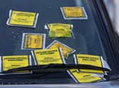 File photo dated 29/12/17 of parking notice fixed penalties attached to the windscreen of a car, as drivers have been hit by a 50% increase in the number of parking tickets issued by private companies.