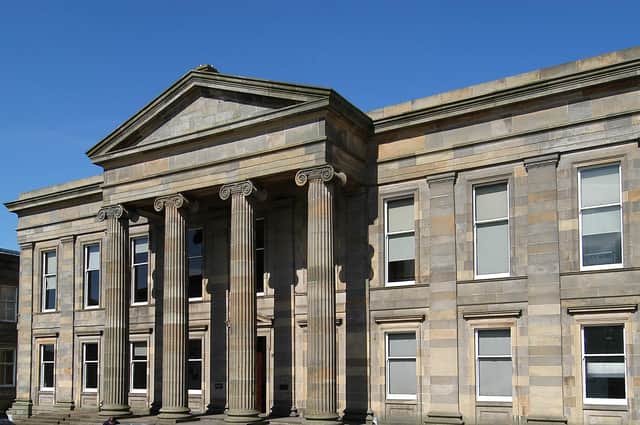 Serial crook Jordan Nisbet was jailed at Hamilton Sheriff Court for stealing piggy banks from a school