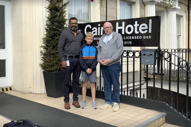 Dave Kelly's son and father at the Cairn Hotel