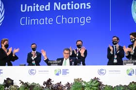 COP26 president Alok Sharma attempts to stop applause for his efforts as the summit ended in Glasgow amid what he called 'deep disappointment'.