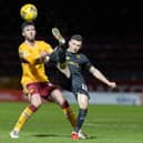 Motherwell’s Sean Goss battles for the ball with Livingston's Jason Holt in 'Well's last game on Boxing Day (Pics by Ian McFadyen)