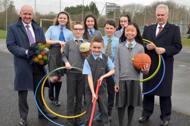 Councillors Frank McNally (left) and John McLaren with a group of St Jospeh’s Primary pupils