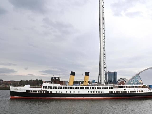 TS Queen Mary berthed beside Glasgow Science Centre on Friday. Picture: John Devlin