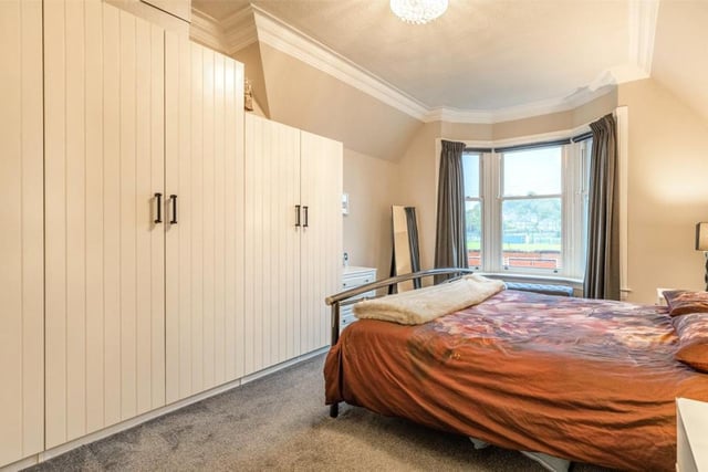 The main bedroom has a big bay window.