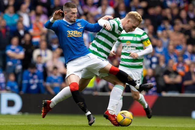 Rangers' Ryan Kent (left) in action with Celtic's Stephen Welsh during a cinch Premiership match at Ibrox, on August 29, 2021.