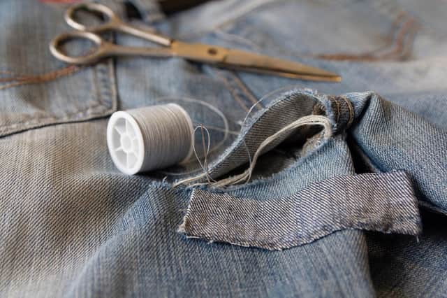 Sew a rip in clothing rather than replace the item (photo: Adobe)